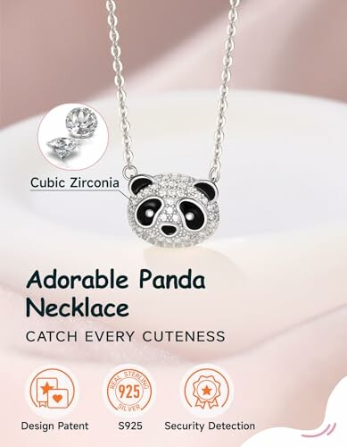 Panda necklace with cubic zirconia and sterling silver details.