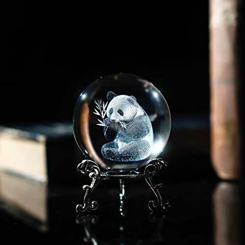 Crystal ball with panda engraving on stand