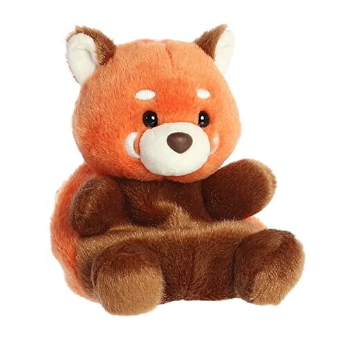 Cute red panda plush toy sitting.