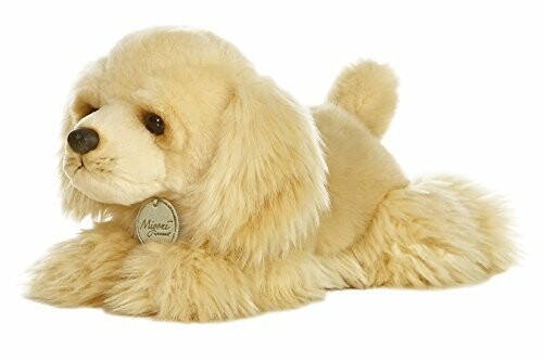 Fluffy plush dog toy lying down.