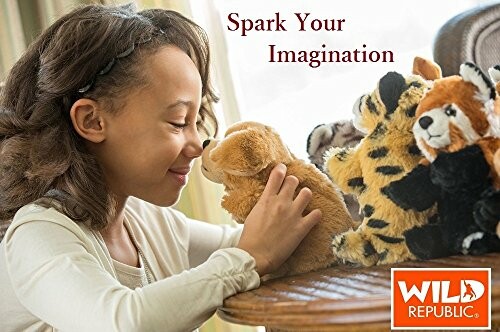 Girl playing with stuffed animals, smiling and imaginative.