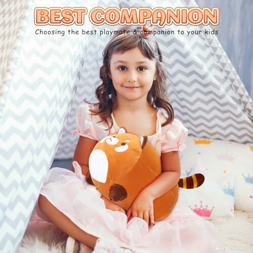 Girl in pink dress holding a stuffed animal in a tent.