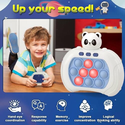 Child playing with a panda-themed interactive toy with buttons.