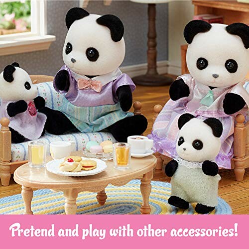 Toy panda family dolls in a living room setting with accessories, perfect for kids and collectors alike!