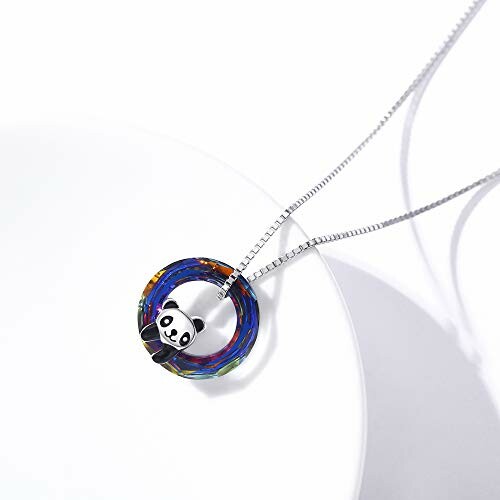 Colorful panda pendant necklace on white background