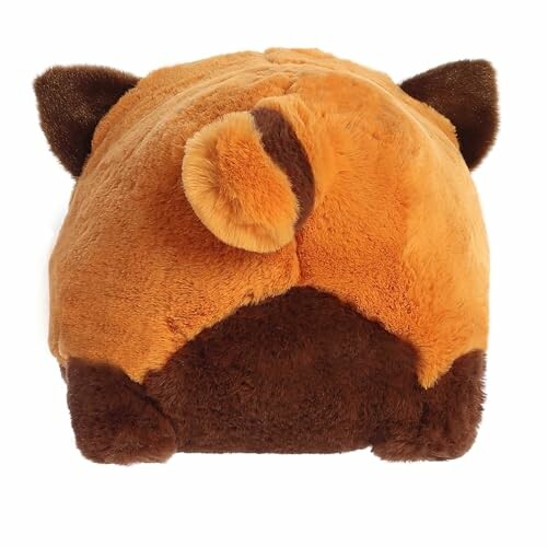 Back view of a plush animal with brown and orange fur.