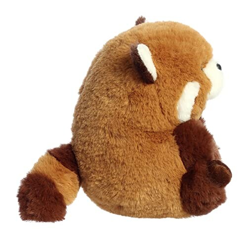 Side view of a plush red panda toy