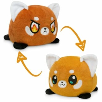 Reversible fox plush toy with angry and happy faces.