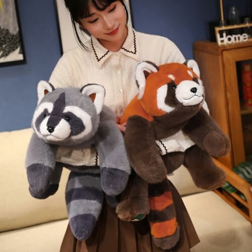 Woman holding raccoon and red panda plush toys, a perfect example of the product's cuddly design.